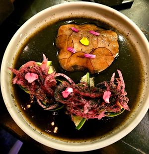 Black aguachile, hearts of palm, king oyster Mushroom, fermented black soybean, xnipec at La Bartola in Toronto