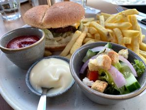 Vegan burger with vegetable patty, walnuts, fries and vegan mayo at De Beren in Leerdam