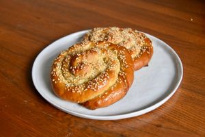 Tahini rolls, classic Turkish pastry has a unique way of rolling it which makes it flaky and soft at the same time. It has so much tahini in it.  at Atelier Racines MTL in Montreal
