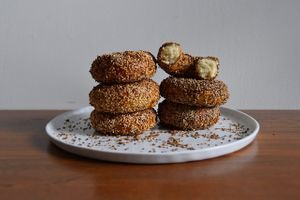 Istanbul style bagels are proofed with raisin molasses and covered with so much in sesame.  at Atelier Racines MTL in Montreal