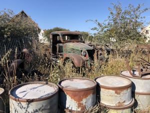Old cars outside  at Crêperie Tati in Faro