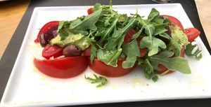 Caprese salad with Coconut burrata ( vegan and delicious ) at Aromatic Restaurant in Altafulla