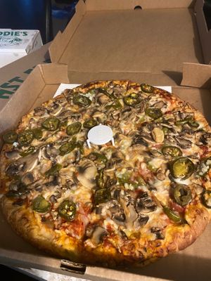 Pizza with marinara, vegan cheese, mushrooms, onions, green peppers, and jalapeño peppers. at Fast Eddie's Pizza in Bellville