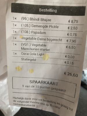 My receipt. The ‘manchurian’ is about as filling as falafals. The dalia and okra’s were both amazing and the poppadoms were perfect.  at Namaskar  in Utrecht