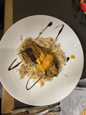 Stuffed aubergine and rice noodles  at La Cuina d'Adel in Valencia