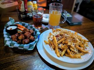 Vegan wings and vegan disco fries at The Green Pig Pub in Salt Lake City