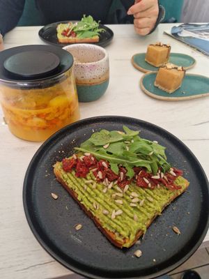 Avocado toast and nut cakes at Doppio in Grodno