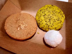 Peanut butter cookie, lemon-chia cookie, vegan "raphaelo" ball at Vegan Place in Tbilisi