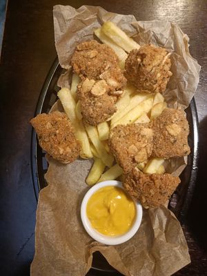 Nuggets with fries and vegan cheese sauce at Vegan Place in Tbilisi