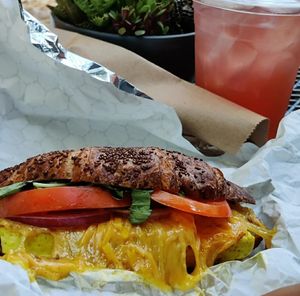 OG breakfast croissant sandwich & ice oolong rose lemonade(?) at Little Barn Coffee House in Los Angeles
