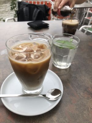 Iced coffee with oat milk 🥛 and wataaa  at Strandbar Herrmann in Vienna