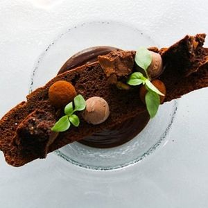 Chocolate and Basil Soup with chocolate biscuit, chocolate brownies, chocolate truffles and chocolate ice cream. Only if you like chocolate. at Oliveira Kitchen in East London