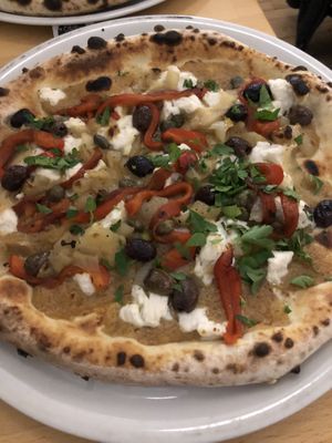 Garlic pate based pizza… so good !!!  at Pizzeria Grano in Vancouver