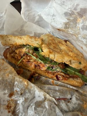 Stick chicken focaccia sandwich   at How On Earth in Exeter