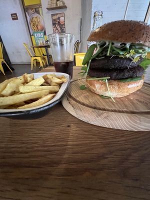The superfood vegan burger next to a dish of fried chips  at Submarine Burger in Rijeka