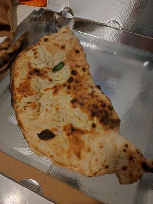 Calzone Contadino (vegan mozzarella, fried aubergines, courgettes and peppers) at Spicchi d'Autore in Naples