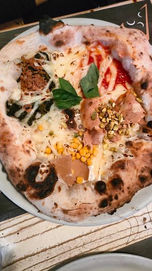 Salsiccia e friarielli + mimosa + mortadella + margherita at Spicchi d'Autore in Naples