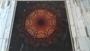 I loved this beautiful drawing on the floor. at Brio in Tarifa