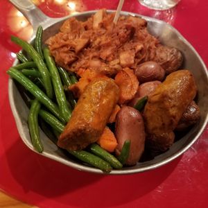 Vegan Skillet with Beyond sausage, BBQ jackfruit, carrots, green beans. Also came with cornbread. at Walt Disney World - Whispering Canyon Cafe in Lake Buena Vista