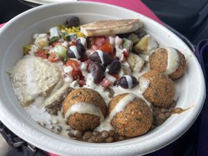 Regular Bowl with falafel, turmeric basmati rice, zucchini, tomato & cucumber salad, pita, tahini & lentils  at Orion Fresh Mediterranean in Boca Raton