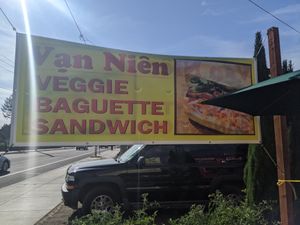Sign on Foster at  Van Nien Vegan Baguette Food Coffee Tea in Portland