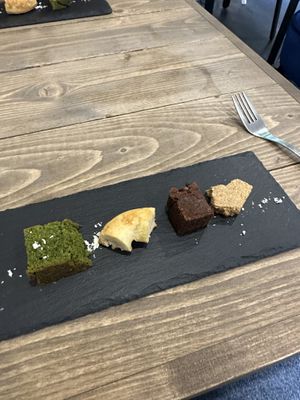 left to right: matcha cake, banana bread, cacao brownie and oat biscuit   at Vegeto LIKO in Sendai