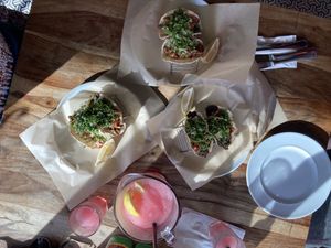 All three of vegan tacos (beans, mushrooms, chili) and pink margarita  at Tapachula in Tel Aviv