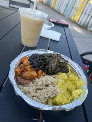 Callaloo, savory sweet potatoes, black beans, brown rice, curry tofu-All waaaay tastier than it looks! Promise you!  at The Floribbean in St Petersburg