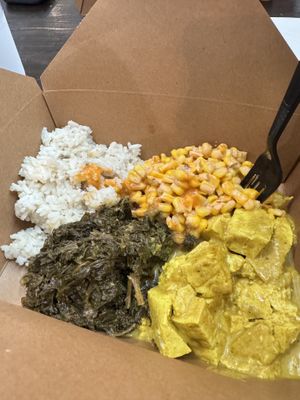 Curry tofu with coconut rice, corn salsa and callaloo  at The Floribbean in St Petersburg
