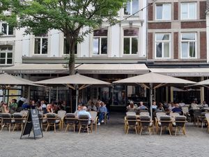 Large outdoor seating area at De Gouverneur in Maastricht