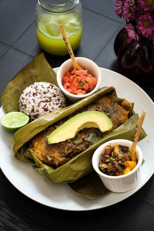Bollerismo
tipical green plantain and peanut dough filled with 3 types of mushroms, zuccini and green beans. Ceviche, chili sauce, rice with red quinoa. Avocado as in most of meals at La Suculenta in Guayaquil