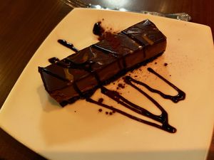 Salted caramel & chocolate cheesecake  at The Orchid Vegan Restaurant in York
