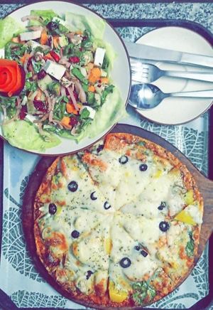 Tomato Pizza with Seasonal Veggies & Cafe Spcl. Healthy Salad at The 7 Life Cafe in Rishikesh