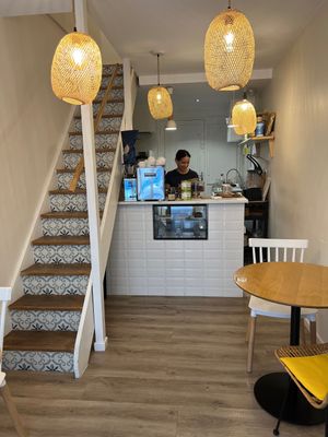 Entrance. There is one table down, one outside, four upstairs.  at L'avocat Cafe in Lyon