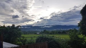 The rooftop view as the sun set at Gypsy Soul in Pai