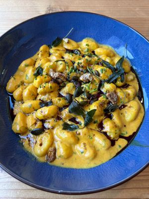 Pumpkin gnocci with candied walnuts, sage and green salad on the side at Heuriger Steinschaden in Langenlois