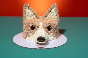 6" corgi cake made with buttercream, chocolate chip cookies, a sugar cone, and dark chocolate at Bartleby's Ice Cream in Chicago