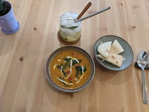 Red Thai curry soup with flat bread at LoveUrth 러브얼스 in Busan