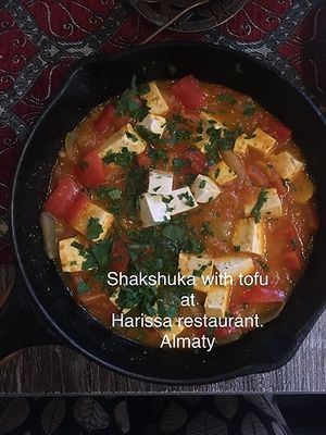 Tomato and onion sauce with tofu  at Harissa in Almaty