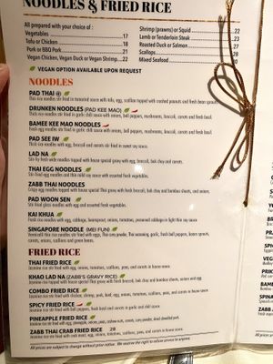 Green leaf marks vegan options by request in the main menu   at Zabb Thai Cuisine Newport Beach in Newport Beach