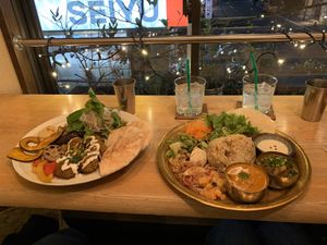 The falafal dish on the left en the brown rice dish on the right were both absolutely delicious!! at Meu Nota in Tokyo