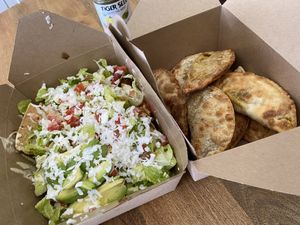 Nachos and alllllll the empanadas! at La Chia Vegana  in Lake Worth