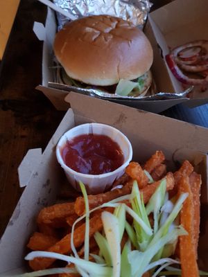 Delicious take away food and a few chairs at the breakfast bar for eating in 💚 at Seitan Hustle in Fleetwood