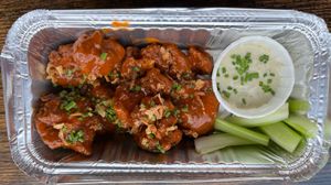 ‘Buffalo Wings’ with hot sauce and garlicky ‘ranch’ dip with crunchy celery sticks. (100% plant-based, meat-free, dairy-free and vegan). Absolutely delicious! 👌 at Seitan Hustle in Fleetwood