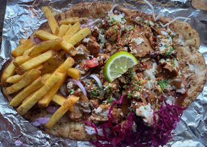 Classic Special Mixed Kebab (full portion) high in protein meat-free ‘lamb’ ‘doner’ & vegan ‘chicken’ on a warm, fluffy garlic flatbread with fresh crunchy veg, garlicky sauce and base fries. 100% meat-free, dairy-free, plant-based & vegan. at Seitan Hustle in Fleetwood