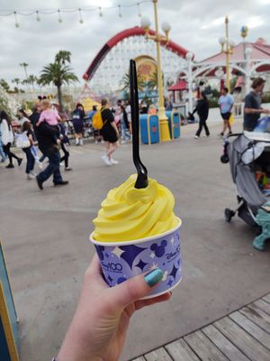 It's lemon soft serve. Very tasty and refreshing, sweet and slightly tart it is very good. The price was around $5-6, but the serving is good for the price. Most options are vegan  at Disneyland - Adorable Snowman Frosted Treats in Anaheim