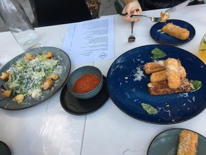 Cesar salad and mozzarella stick appetizer  at BAIA in San Francisco