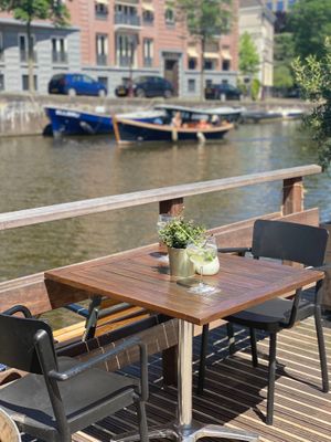 Table next to the water  at Amstelhaven in Amsterdam
