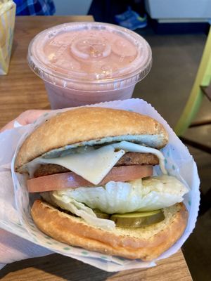 Single burger with grilled onion and vegan cheese, and a citrus smoothie at Amy's Drive Thru  in Corte Madera