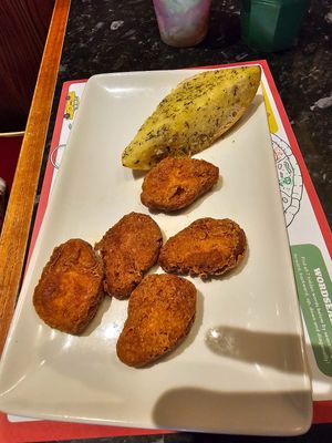 Kids' nuggets and garlic bread at Frankie & Benny's in Croydon